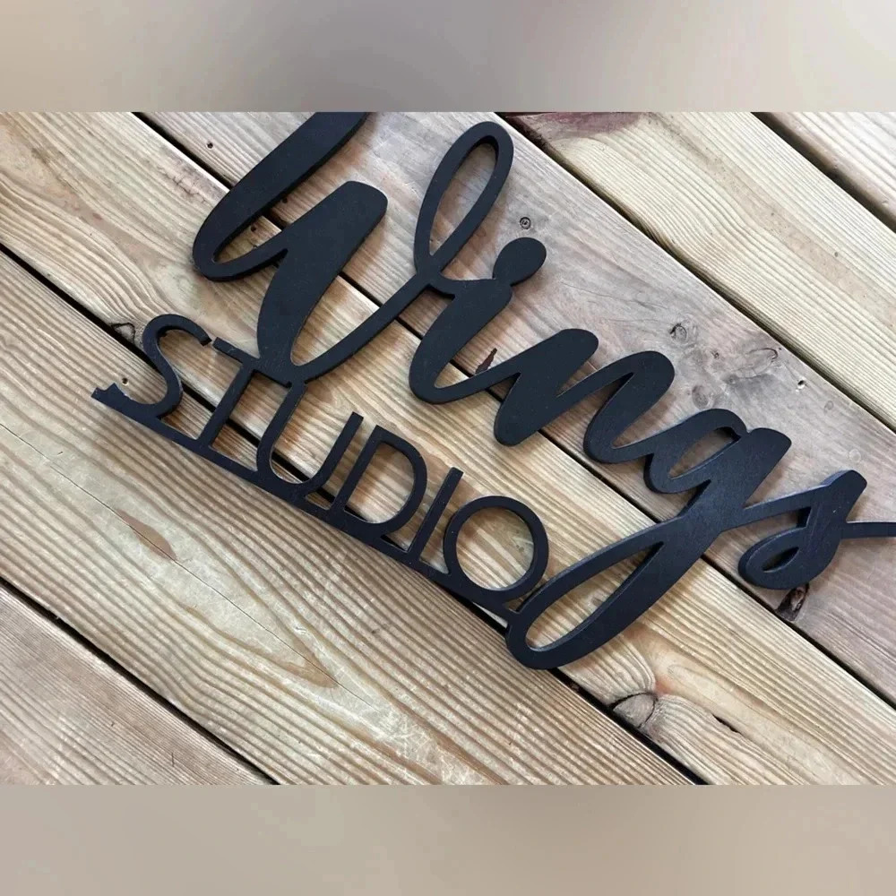 Wood sign WINGS STUDIO Black